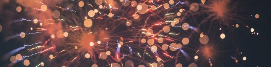 AWS partner logo|Lights against black backdrop|Lights against a black backdrop