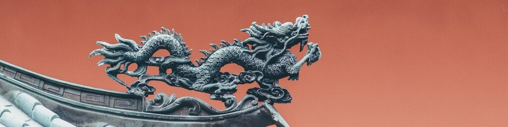 Freddie with the Singapore Team|Freddie and Rob Kelly|Singapore skyline|Freddie Heygate and Rob Kelly|Dragon